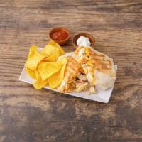 Grilled Chicken Quesadilla · Filled with mild salsa, melted mixed cheese, sour cream, and pico de gallo.