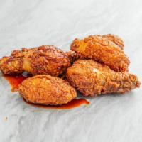 Spicy Garlic Fried Chicken · Crispy and crunchy double battered jumbo fried chicken wings (5pcs). Served with pickled dai...