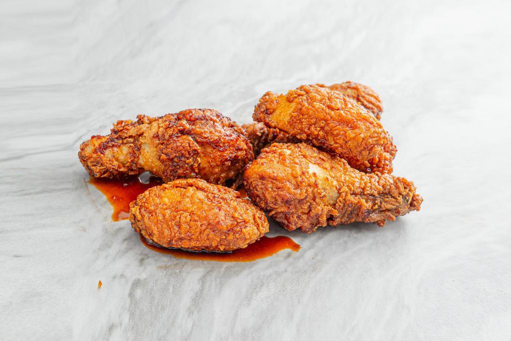 Spicy Garlic Fried Chicken · Crispy and crunchy double battered jumbo fried chicken wings (5pcs). Served with pickled daikon and Spicy Garlic sauce on the side.
Contains: Gluten