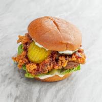 Tangy Maple Fried Chicken Sandwich · Deep fried chicken thigh glazed with maple katsu sauce. Served on a potato roll with mayo, l...
