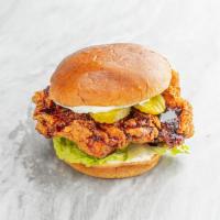 Soy Garlic Fried Chicken Sandwich · Deep fried chicken thigh glazed with soy garlic sauce. Served on a potato roll with mayo, le...