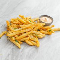 Truffle Fries. · Battered fries with white truffle oil. Served with sriracha mayo.
Contains: Gluten, Eggs