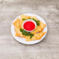 16. Crab Meat Rangoon · 10 pieces. Fried wonton wrapper filled with crab and cream cheese. 
