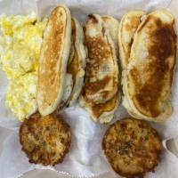 Bacon Dippers plate · Bacon pancake dippers, served with a side of scrambled eggs and hash browns.