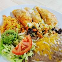 Tacos al Carbon · 3 tacos with tender flamed broiled and chopped steak or chicken breast. Served in warm corn ...