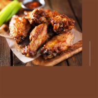 Buffalo Wings · Fried and tossed in your choice of sauce