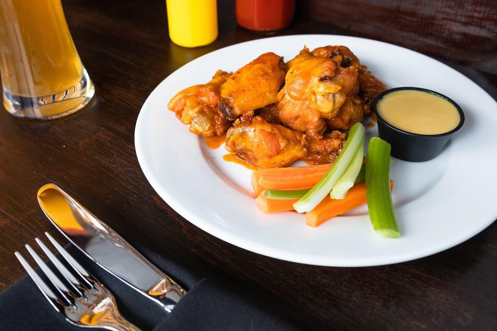 Buffalo Wings · Classic hot wings served with blue cheese and ranch. 6 pieces.