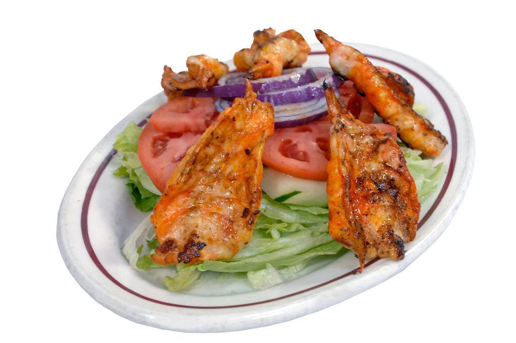 Shrimp Salad · Grilled or breaded shrimp, lettuce, tomato, cucumbers, onions & dressing.