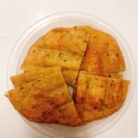 17. Scallion Pancakes · Savory folded flatbread. 