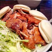 Peking Duck · Roasted duck, served with fresh spring onions, cucumbers, 3/4 hoisin sauce and 4/8 lotus buns.