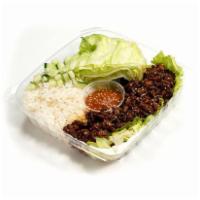 Summer Wrap · Sweet & spicy pork, Iceberg lettuce, cucumber and steamed rice with Korean Ssamjang sauce.