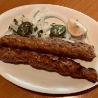 Seekh Kabab · Ground chicken mixed with onion, ginger and green chilies. 