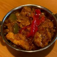Chicken Chili · Roasted chicken cooked with onions, bell peppers (red, yellow and green), chili powder, cumi...