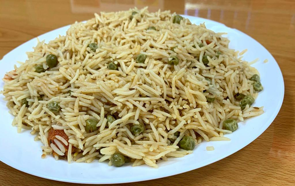 Mutter Pulao · Basmati rice cooked with green peas. 