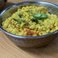 Daal Mash · White lentils cooked with herbs and spices. 