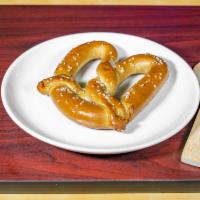 Pretzel · Soft Bavarian style warm pretzel served with cheese sauce. Made to order.