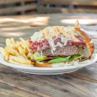 The Blarney Burger · Monolithic 1/2 lb. burger with corned beef, kraut, Swiss, Dullahan Island dressing, mixed gr...