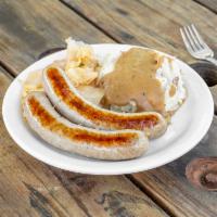 Bangers and Mash · Traditional Irish bangers served with bacon cabbage, mash and gravy.