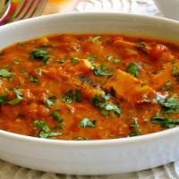 Chicken Tikka Masala · A favorite with all Indian food enthusiasts, made with Oven baked boneless chicken combined ...