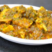 Gongura Chicken Curry · Minces chicken with rich tomato cashew and almond sauce cooked with Gongura (slight sour tas...
