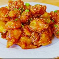 Sesame Chicken · Served in a sweet sauce with sesame seeds.