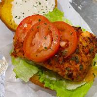 Salmon Burger  · Mayo, Lettuce and Tomatoes 