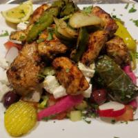 4. Chicken over Greek Salad · Chicken shawarma or chicken kabab & mixed grilled vegetables over house salad.