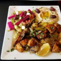 3. Chicken Kabab Platter · Marinated cubes of grilled chicken with mixed grilled vegetables.