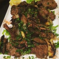 8. Lamb Chops Platter · Grilled marinated lamb chops with 0 vegetables.
