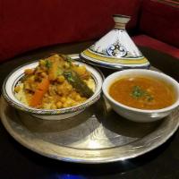 2. Chicken Couscous · Chicken, assorted vegetables and chickpeas over couscous (steamed semolina grains).