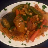 3. Lamb Couscous · Lamb, assorted vegetables and chickpeas over couscous (steamed semolina grains).