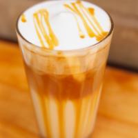 Iced Caramel Macchiato · A layered Latte where the Espresso is poured over iced milk and Caramel is drizzled on top.