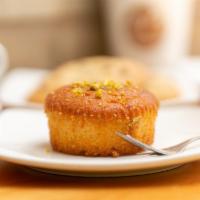 Dad's Delight · A sponge cake flavored with Cardamom, Rose water, and Pistachios