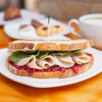 Turkey and Cranberry Sandwich · roasted turkey breast, cranberry sauce, cream cheese,  spinach 