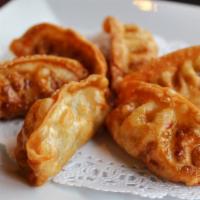  Fried Dumpling  · Fried dumplings with meat choices Pork, chicken, vegetables served with sweet and chili 
