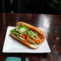  Viet Street Sub-Banh MI · Toasted baguette, house special mayo, cucumber, pickle carrot, cilantro, Jalapeno, protein.