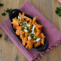 Buffalo Mac and Cheese · Gluten-free rotini tossed in Buffalo queso. Contains cashews.