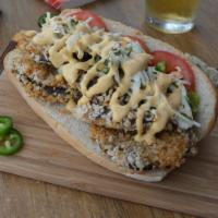 Second Pair of Black Jeans Eggplant Po' Boy · Breaded and baked eggplant with slaw, salsa, lettuce, and remoulade on a hoagie bun. Nut-free.