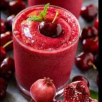 Yogo Pom Smoothie · Pomegranate, dark cherries, yogurt, birthday cake whey isolate protein.