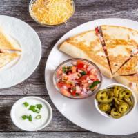 Shrimp Quesadilla · Our quesadillas are like no other. Stuffed with our wild caught shrimp, Mexican cheese and p...