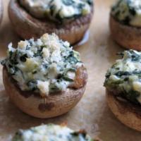Spinach Stuffed Mushroom · A blend of spinach, Monterrey Jack and our Imperial sauce. We use fresh cut silver dollar mu...