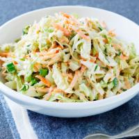 Cole Slaw · Fresh Napa Cabbage Hand Tossed with Mayonnaise, Salt, and Pepper.