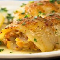Seafood Stuffed Flounder · Our wild caught flounder stuffed with our tangy seafood stuffing. Truly one of our favorites...