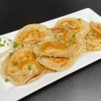 Crab Stuffed Pierogies · 9 pack. These homemade pierogies are stuffed with crab and a cheesy mashed potato filling, s...