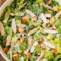 Chicken Caesar salad · Romaine lettuce Gilled chicken parmigiana cheese croutons Caesar dressing