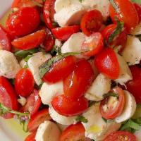 Tomato ＆ Mozzarella · Fresh mozzarella, tomatoes, olive oil, and basil.