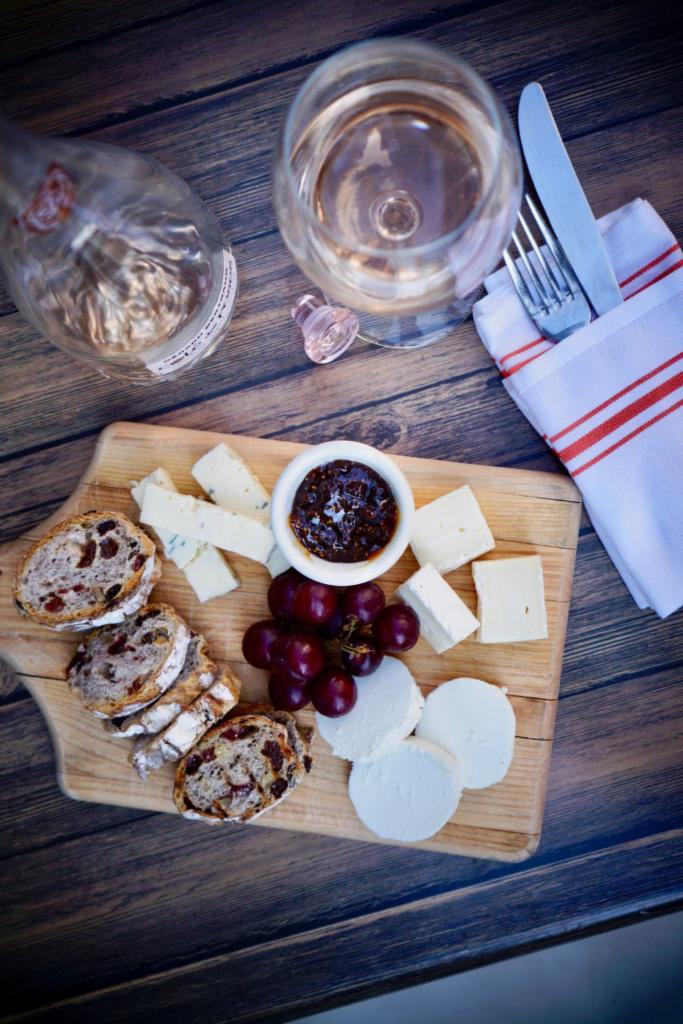 Formaggi  Choice of 2 · Cheese served with grapes, fig jam, and toasted raisin bread. 