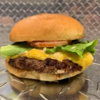American Cheeseburger · 1/3 Lb  Triple Blend Of USDA Prime Beef With Onions, Lettuce, Tomato, and Fancy Sauce