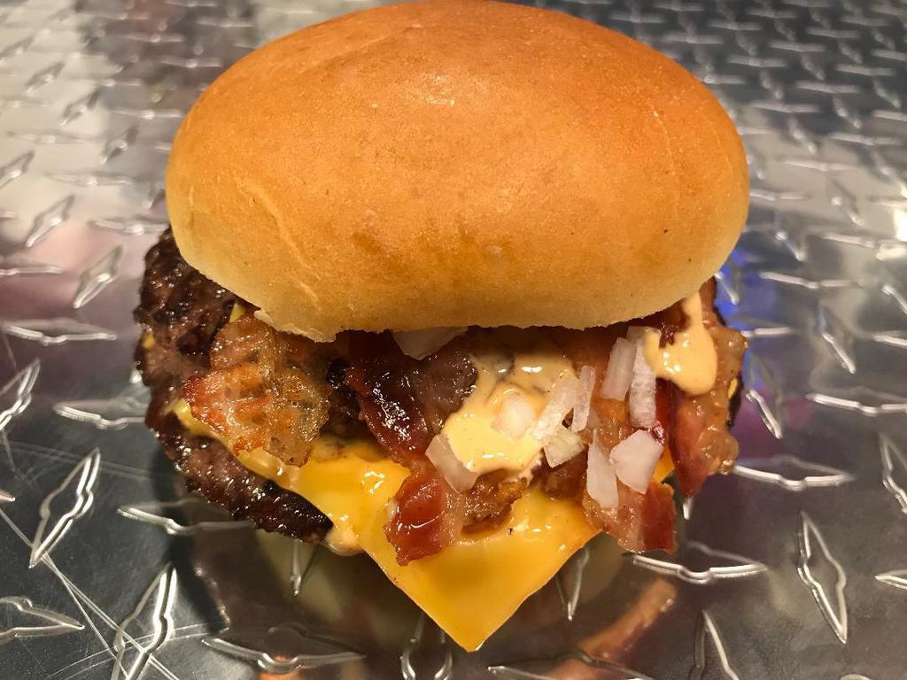 American Double Bacon Cheeseburger · (2)  1/3 Lb  Triple Blend Of USDA Prime Beef With Bacon, Onions, Cheese, And Fancy Sauce 