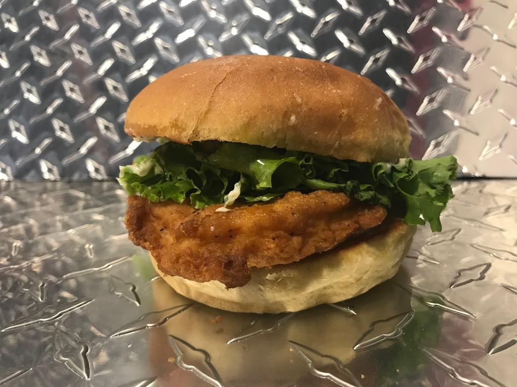 American Chicken Sandwich · Breaded Chicken Breast With Lettuce, Pickles And Fancy Sauce